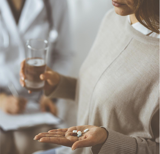 Girl taking medicine img